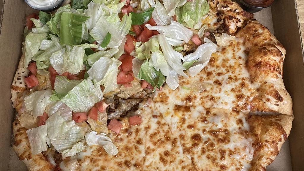 Tex-Mex Pizza (Small) · Salas, marinara base, seasoned meat and onion. After we bake it, we add fresh lettuce, juicy tomato, taco cheese, and tortilla chips, it comes with salsa and sour cream on the side. Ole!