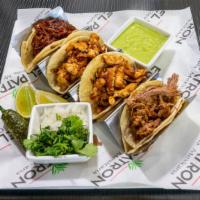 Mexican Street Tacos (4) · Corn mini tortilla served with your choice of grilled steak, grilled chicken, carnitas, chor...