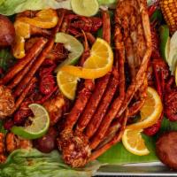 Charolazo · A seafood mix with Shrimp, Crab Legs, Crawfish. With Corn and Potatoes,
Served on a tray wit...