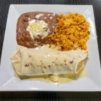Steak & Cheese Burrito · Grande 10´´ flour tortilla stuffed with grilled flank steak topped with melted cheese, and s...