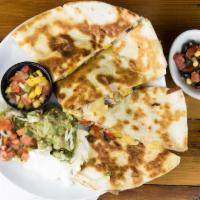 Veggie Quesadilla · Giant tortilla filled with a ton of cheese, folded and grilled with fajita peppers, mushroom...