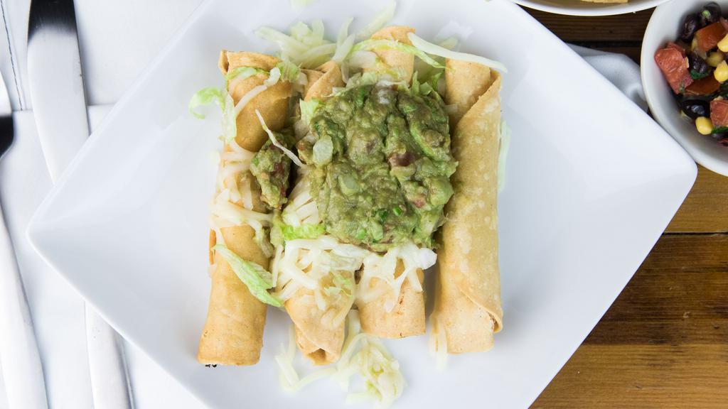 Rosarito Rolled Tacos · Shredded Chicken conveniently rolled up in corn tortillas and lightly fried. Served with Lettuce, Monterrey Jack Cheese, and Guacamole on top.