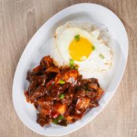 Beef Belly Over Rice 土豆烧牛腩饭 · Premium beef belly with house special sauce, topped with potatoes, peppers and fried egg.