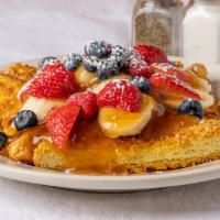 Crunchy French Toast · Dipped in Our Crunchy Batter & Grilled Golden Brown, Served with Carmelized Bananas and Fres...