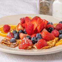Fresh Berry Crepes · Crepes Topped with Fresh Strawberries, Blueberries and Raspberries, Dusted with Powdered Sugar