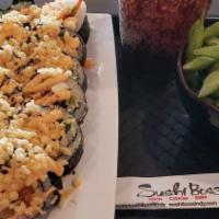 Spicy Salmon Crunch Roll · Spicy. Seaweed wrap, spicy salmon, cream cheese, green onion, carrot, boss sauce, tempura cr...