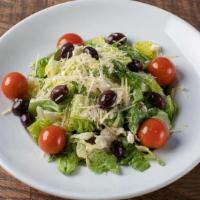 Greek Salad · Romaine, kalamata olives, Feta cheese, cherry tomatoes, Parmesan, olive oil.