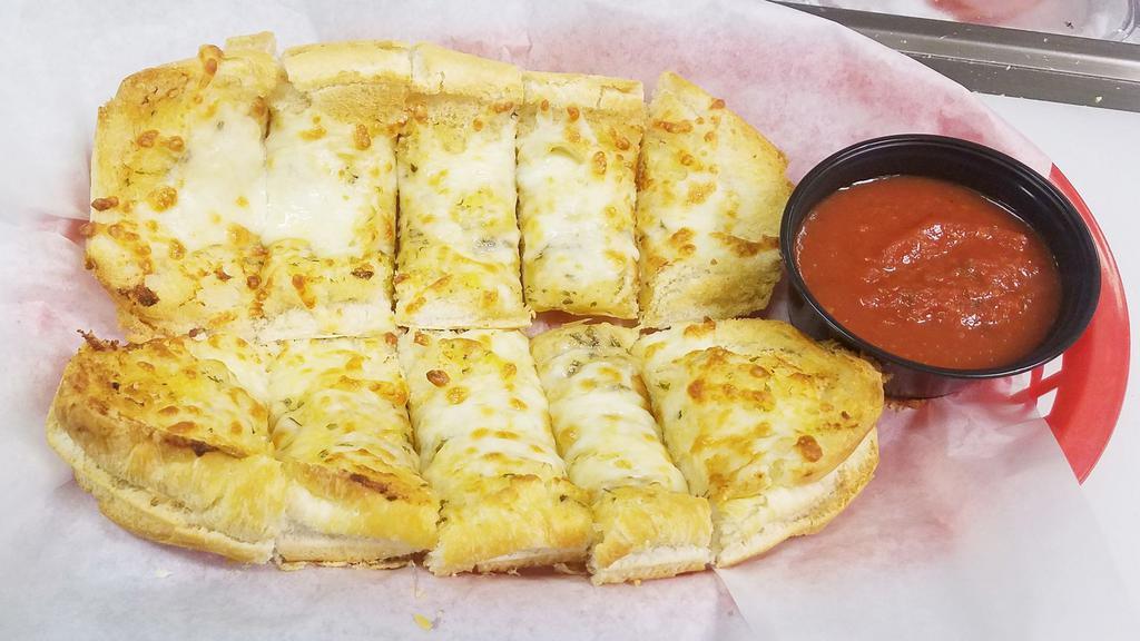 Garlic Cheese Bread · Italian bread covered in garlic butter & provolone cheese & baked until golden brown. Served with marinara sauce on the side