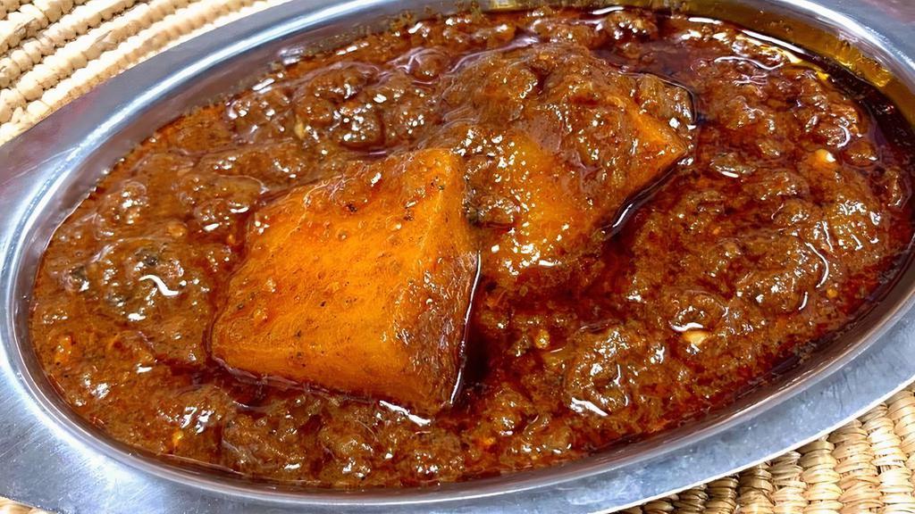 Dinich Wot (Side)- (Spicy) Chopped Potatoes Stewed In Spicy Berbere Sauce · Chopped Potatoes stewed in a rich and spicy berbere sauce