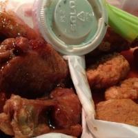 Regular And Boneless Wings · Our wings come 8 at a time, plain or smothered in buffalo or BBQ sauce. They are served with...