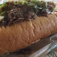 Italian Beef · Italian beef, giardiniera, green peppers, onions and provolone, folded into our hand-tossed ...