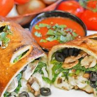 Veggie · Italian dressing, mushrooms, green peppers, onions and mozzarella cheese folded into our han...