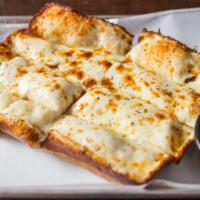 Motor City Cheesy Sticks · Our hand-tossed dough sprinkled with garlic and covered with a blend of cheeses. Cheesy brea...