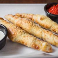 Chubbies (Pepperoni Rolls) · Pepperoni, mozzarella and provolone, carefully rolled into our hand-tossed dough and baked t...