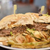 Avli Burger · homemade ground lamb shoulder patty, herbs, spices, lettuce, tomato, onion & greek fries