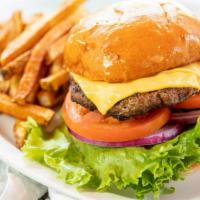 Cheeseburger · 1/3 lb. Cheeseburger topped with Lettuce, Tomato, and Onion with Pickles on the side. Served...