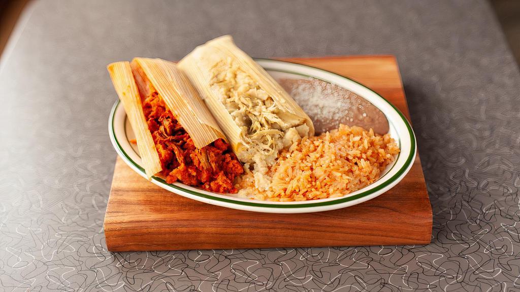 Tamales · Choose between Chicken in Salsa Verde or Pork is Salsa Rojo. Served with Rice & Beans.