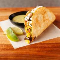Vegetarian Taco · Vegetarian taco topped with Roasted Corn, Poblano Pepper, Red/Green peppers, zucchini and Ci...