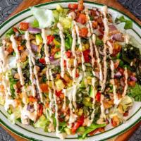 Southwest Salad · Romaine lettuce topped with pico de gallo, roasted corn, onions, squash, bell peppers, and p...