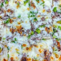 Philly Steak Pizza Round · Philly steak, green peppers & onions with a Cajun crust.