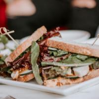 Vegetarian - The Herbivore Sandwich · A vegetarian playground stacked with fresh cucumber, tomato, red onion, avocado, and spring ...