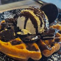 Cookies & Cream · Waffle topped with Oreos, house made whipped cream, chocolate chips, and chocolate drizzle