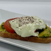 Avocado Toast - Mother Of Pearl · Toasted Saskatoon Prairie bread from CRUST, smashed avocado, medley tomatoes, fried egg, top...