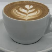 Cappuccino (8 Oz) · 1/3 espresso, 1/3 steamed milk, 1/3 foam.
