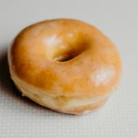 Raised Glazed Ring · The classic. Golden brown from yeast raised dough. Topped with glaze, icing, or sprinkles.