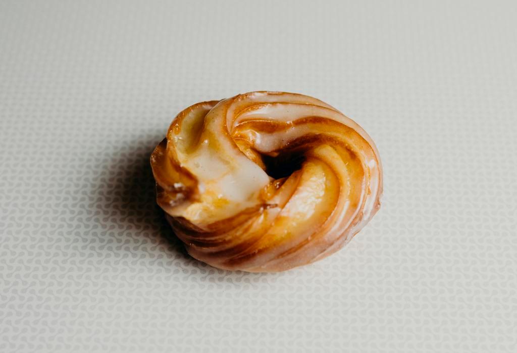 French Cruller · Part donut, part souffle. The cruller combines the best of all worlds. Light and airy, yet rich and buttery.