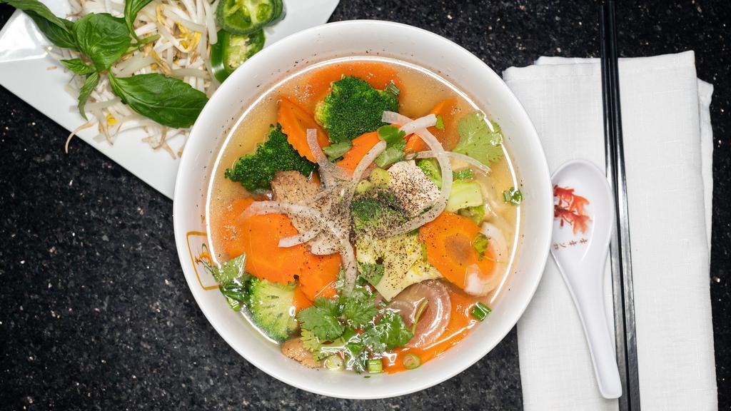 Pho Vegetable · Vegan. Vegetarian. Gluten-Free. Jasmine 26 original clear herbal veggie broth, rice noodles, mock duck, tofu, and vegetables served with basil, jalapeno, sprouts, and lime.