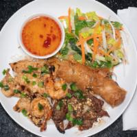 Saigon Noodle Salad · Gluten-Free. Grilled shrimp, chicken, pork, and a pork egg roll served on a bed of rice nood...