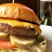 Tavern Burger · American cheese, lettuce, tomato, pickles, wildwood sauce