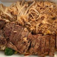 Hibachi Steak · Choice strip steak grilled with garlic butter and sumo sauce.
