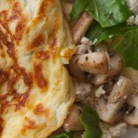 Mushroom Omelette* · Mushrooms, parsley, garlic, scallions, goat cheese.