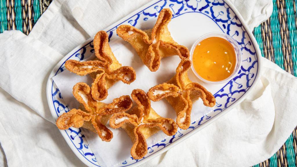 Crab Rangoon · Crab meat, onion and cheese inside wonton skin, fried to perfection, served with plum sauce. Delicious!