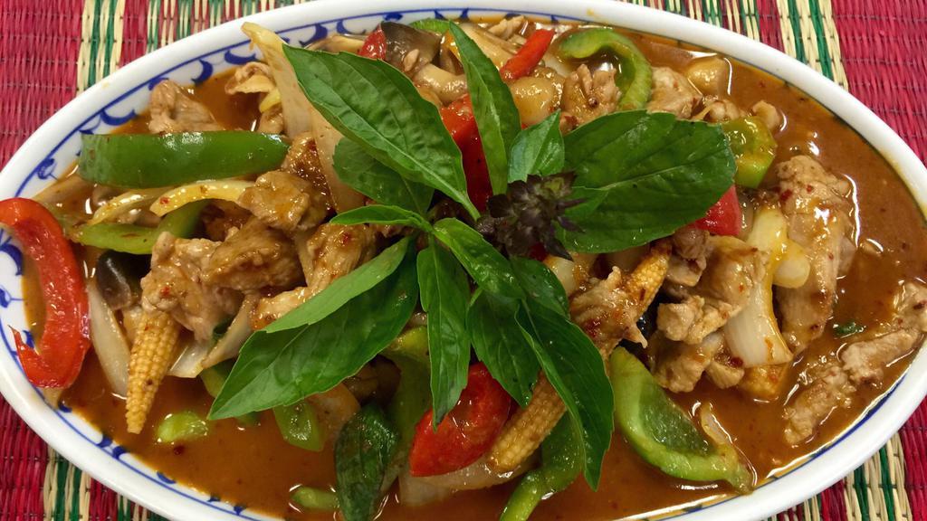 Pud Prig Pow · Slices of chicken, beef or pork sauteed with chili garlic paste, basil leaves, baby corns, bell peppers and a touch of coconut milk.