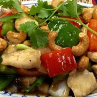 Pud Cashew Nuts · Sliced chicken, beef or pork sauteed with cashew nuts, bell peppers, onions, straw mushrooms...