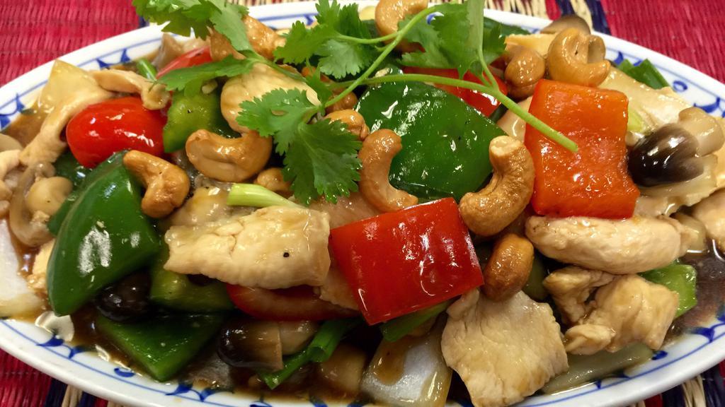 Pud Cashew Nuts · Sliced chicken, beef or pork sauteed with cashew nuts, bell peppers, onions, straw mushrooms and scallions.