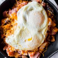 Maine Street Meat Lovers Skillet · Corned beef, bacon, sausage and ham topped with cheddar.