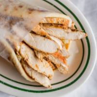 Chicken Gyro Sandwich · Marinated chicken breast, with onions, tomatoes, and tzaziki sauce.