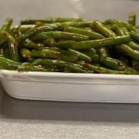 Szechuan String Beans · Crisp green beans stir-fried with garlic or spicy brown sauce. Hot and spicy.