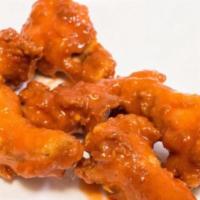 Wing Dings · Your choice of sauce.
