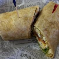 Chicken, Bacon, Ranch Wrap · Grilled Chicken, Bacon, Tomato, Cheddar Cheese, Mixed Greens, and Ranch in a Spinach Tortilla