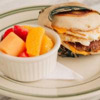 Breakfast Sandwich · Fried egg, sausage, American cheese on a toasted english muffin.