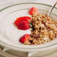 Granola Bowl · Bowl of housemade granola with yogurt and fresh berries.