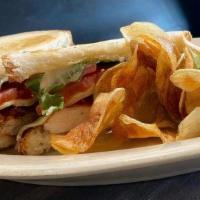 Chicken Club · Grilled chicken, bacon, tomatoes, avocado, lettuce, mayo,  and Swiss cheese. Served with hou...