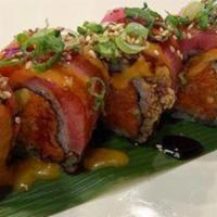 Sesame Crusted Tuna · Spicy tuna and avocado topped with green onion, seared sesame tuna, served with spicy mayo a...