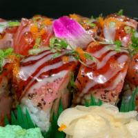 Crazy Tuna Roll · Spicy tuna, tuna tempura, avocado, topped with Pepper tuna, masago, scallion and eel sauce, ...