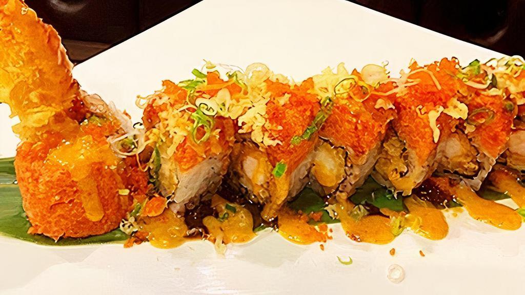 Phoenix Roll (8Pcs) · Shrimp tempura avocado topped with spicy salmon crunch, masago, scallion, eel and spicy sauce.
